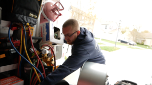 Peterman Tech getting equipment from back of van