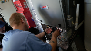 Peterman tech working on furnace